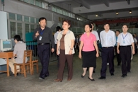 自治区副主席李康在区教育厅厅长高枫、副市长文和群陪同下到我院视察